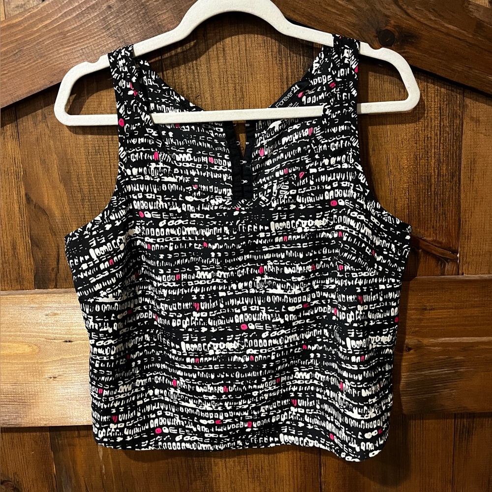 Forever 21.  Loose fit awesome graffiti style crop top tank.